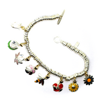 Load image into Gallery viewer, BRACELET &amp; VIOLET WATER LILY TULIP POPPY SUNFLOWER LOTUS DAISY 9K GOLD PENDANTS.
