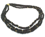 18K YELLOW GOLD THREE WIRES MULTI STRAND NECKLACE WITH DISC GARNET, GOLD SPHERE.
