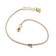 18k rose gold rolo thin bracelet with central small 5mm letter initial F.