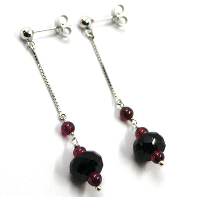 18k white gold pendant earrings, onyx disc, garnet sphere, length 2.2 inches.