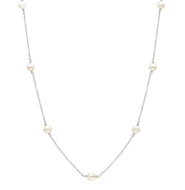 18k white gold necklace, rolo 1mm chain alternate white small pearls 5mm.