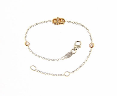 18k rose & white gold bracelet for kids with shoe and zirconia.
