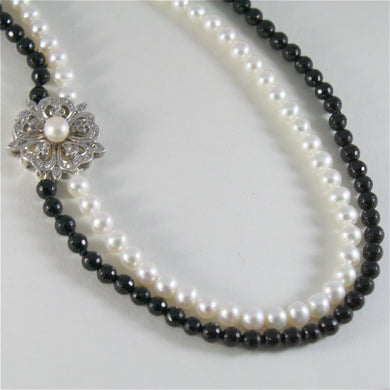 solid 18k white gold necklace with round pearls, onyx and diamonds made in Italy.