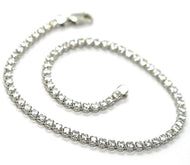 18k white gold tennis bracelet cubic zirconia width 2.5 mm lobster clasp closure.