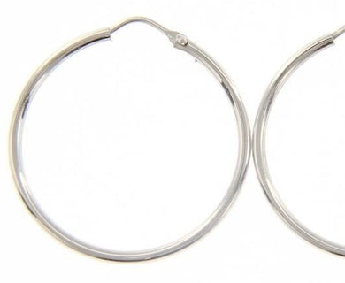 18k white gold round circle earrings diameter 25 mm width 1.7 mm, made in Italy.