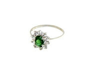 18k white gold flower ring oval green crystal and cubic zirconia frame.