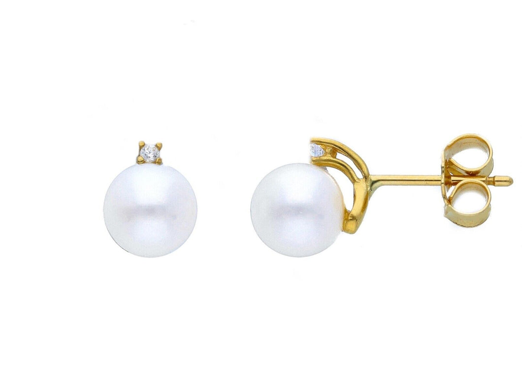 18k yellow gold earrings 7/7.5mm freshwater white round pearls, cubic zirconia.