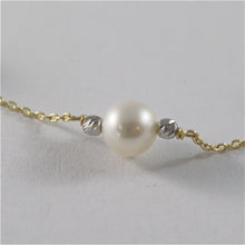 Load image into Gallery viewer, 18k yellow gold necklace with round white 6 7 mm freshwater pearls made in Italy.
