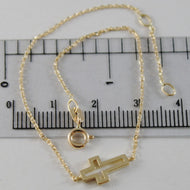 18K YELLOW GOLD THIN 1 MM BRACELET 7.10 INCHES, WITH MINI CROSS, MADE IN ITALY.