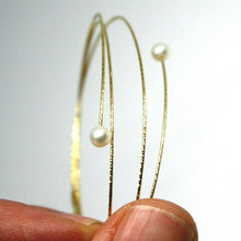 Load image into Gallery viewer, 18k yellow gold magicwire bangle bracelet, elastic worked multi wires, pearls.
