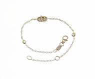 18k white gold bracelet for kids with shoe and cubic zirconia made in Italy.