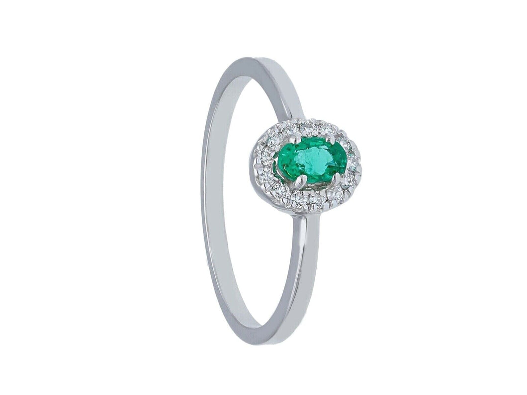 solid 18k white gold ring with oval cut emerald 0.27 carats and diamonds frame.