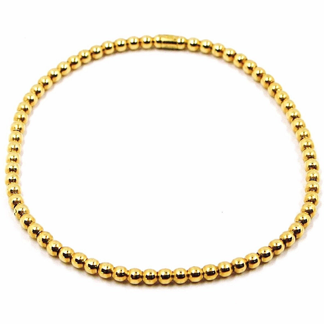 18k yellow gold bracelet, semirigid, elastic, 3 mm smooth balls spheres.