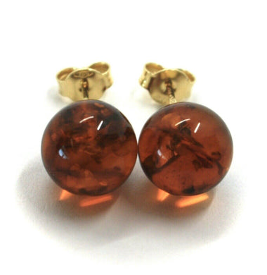solid 18k yellow gold lobe earrings, orange amber 11mm spheres butterfly closure.