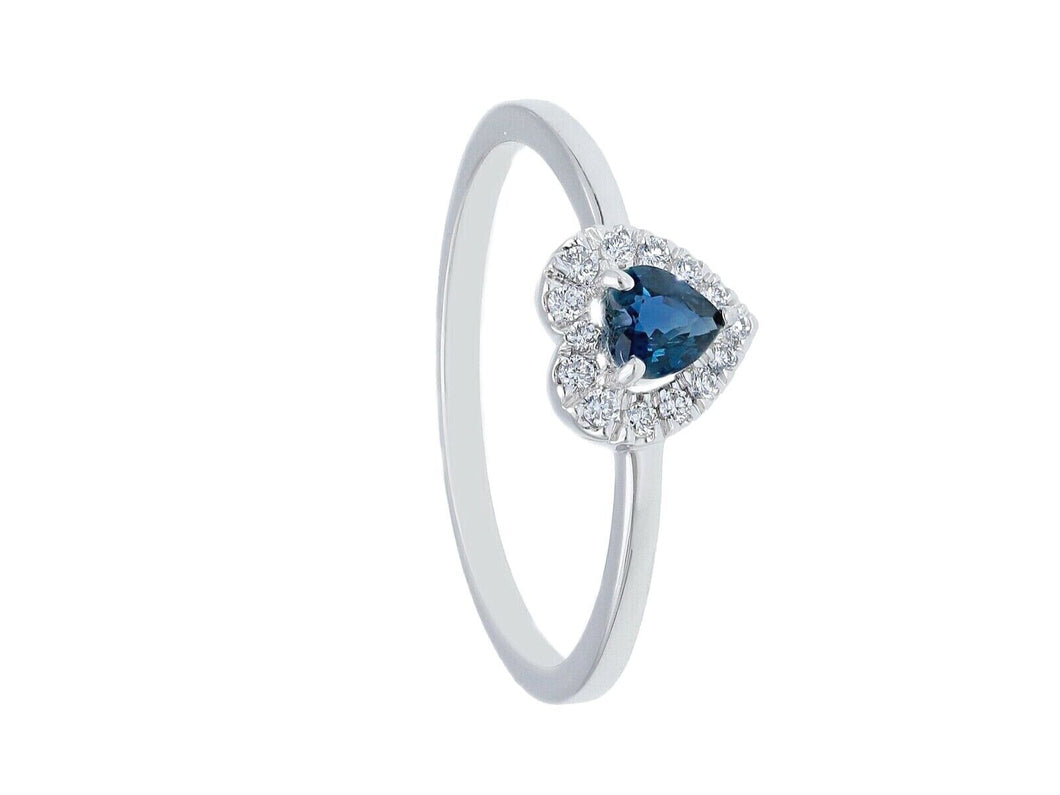 solid 18k white gold ring with heart cut sapphire 0.27 carats and diamonds frame.