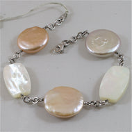 18k white gold bracelet with mother of pearl and pearl disc, made in Italy.