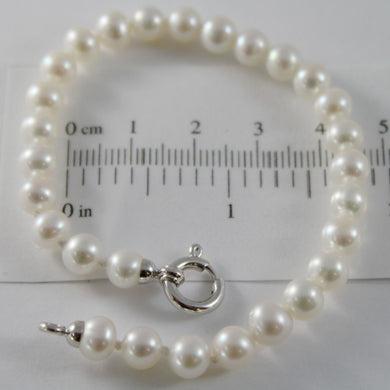 18k white gold bracelet 7.5 inches with white 6 mm fw pearls, made in Italy.