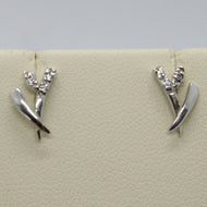 18k white gold earrings, zirconia flower, leaf, length 10 mm.