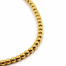 Load image into Gallery viewer, 18k yellow gold bracelet, semirigid, elastic, 3 mm smooth balls spheres.
