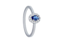 solid 18k white gold ring with oval cut sapphire 0.25 carats and diamonds frame.