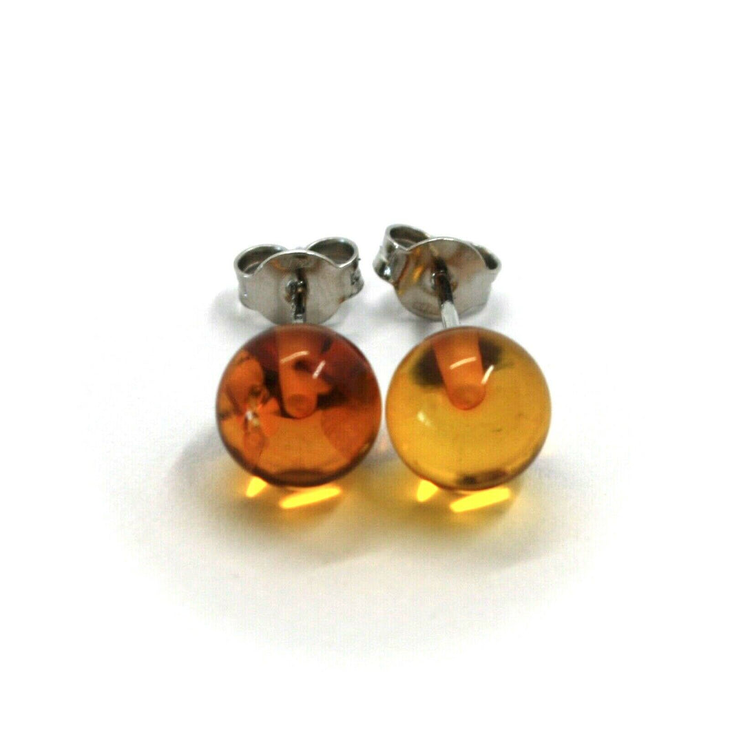 solid 18k white gold lobe earrings, orange amber 8 mm spheres butterfly closure.