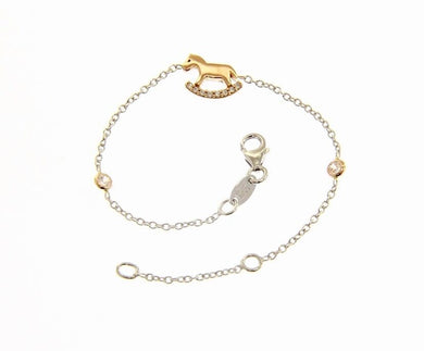 18k white and rose gold bracelet for kids with rocking horse made in Italy.