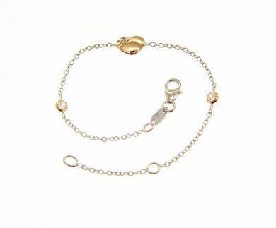 18k rose & white gold bracelet for kids with heart and zirconia.